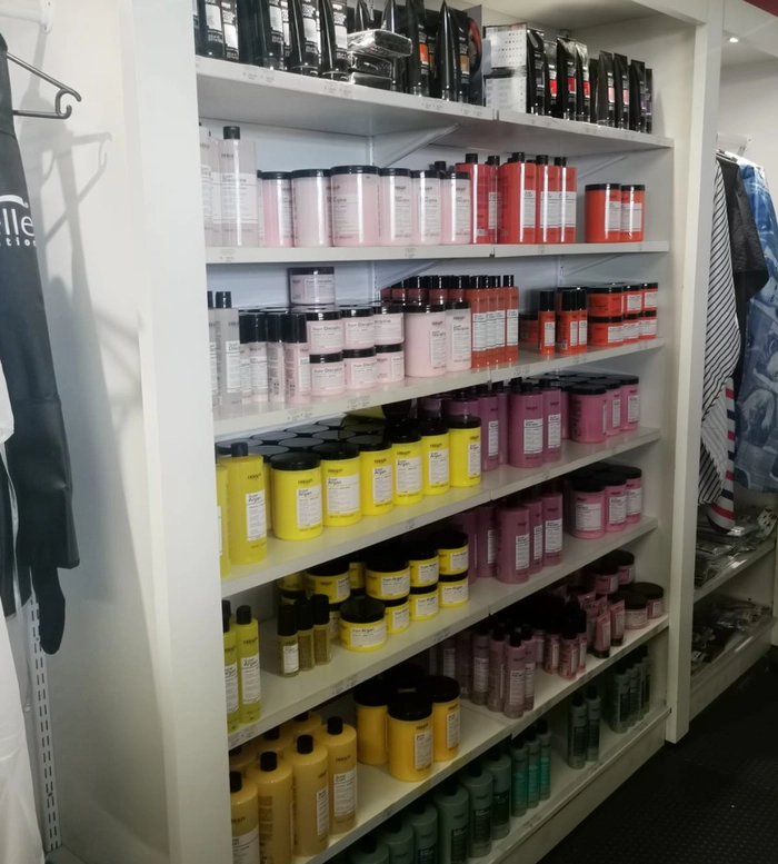 Professional hair care shelves inside Hands Down M5 Park, Maitland