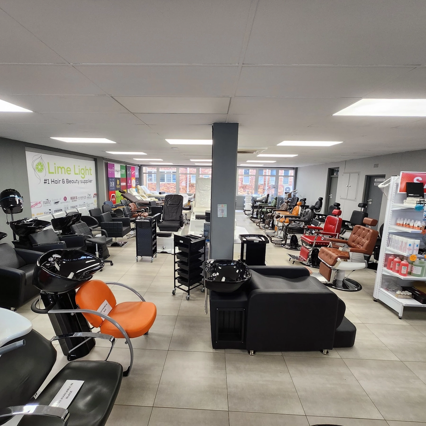 Backwash units and salon chairs on the furniture floor at the Lime Light Super Store in Sandton