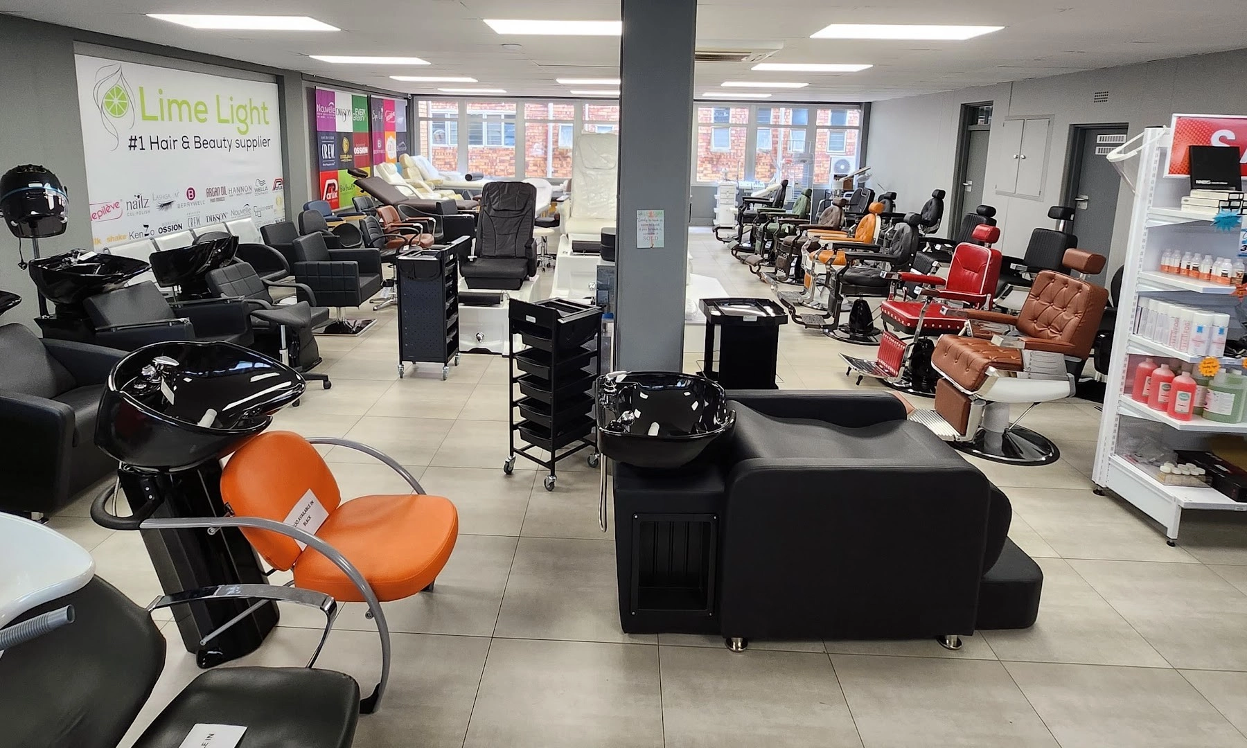 The furniture floor at the Lime Light Super Store in Sandton with wash stations, styling chairs, trolleys, pedicure chairs and barber chairs